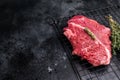Raw hanging tender or onglet beef steak. black background. top view Royalty Free Stock Photo