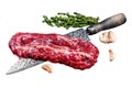 Raw Hanging Tender steak on a butcher knife . Isolated on white background, top view.