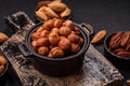 Raw hazelnuts without shells in a bowl Royalty Free Stock Photo