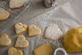 Raw heart shape cookies with sugar icing on wax paper Royalty Free Stock Photo