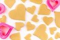 Raw Homemade Heart Shaped Cookies with Pink Cookie Cutter and Flour Royalty Free Stock Photo