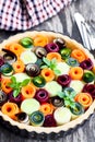 Raw homemade vegetarian pie with colored vegetables. Ready for Royalty Free Stock Photo