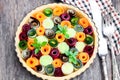 Raw homemade vegetarian pie with colored vegetables. Ready for Royalty Free Stock Photo