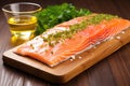 raw honey glazed salmon fillet placed on cedar plank