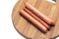 Raw hot dogs on the cutting wooden board Royalty Free Stock Photo