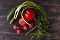 Raw ingredients - cauliflower, potato, zucchini, carrot, onion, pepper, cooking roasted vegetables. On a dark wooden background Royalty Free Stock Photo