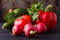 Raw ingredients - cauliflower, potato, zucchini, carrot, onion, pepper, cooking roasted vegetables. On a dark wooden background Royalty Free Stock Photo