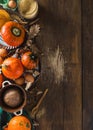 Raw ingredients for cooking pumpkin pie with dry autumn leaves on wooden background copy space Royalty Free Stock Photo