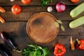 Raw ingredients for cooking ratatouille on wooden table, top vie Royalty Free Stock Photo