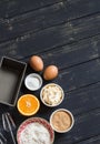 Raw ingredients - flour, eggs, butter, sugar, orange - to cook orange cake. Ingredients for baking.