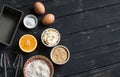 Raw ingredients - flour, eggs, butter, sugar, orange - to cook orange cake. Ingredients for baking.