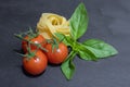 Raw ingredients for tomato and basil pasta Royalty Free Stock Photo