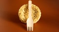 Raw instant noodles in the shape of a circle with a wooden disposable fork. pasta, for the preparation of which it is enough to