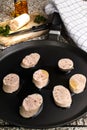 Raw irish white pudding with oil in a pan Royalty Free Stock Photo