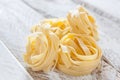 Raw Italian fettuccine nests