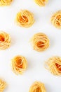 Raw italian pasta creative pattern on white background Royalty Free Stock Photo