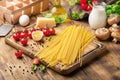 Raw Italian spaghetti with different ingredients for cooking Italian pasta Royalty Free Stock Photo