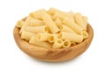 raw italian tortiglioni pasta in wooden bowl isolated on white background with full depth of field Royalty Free Stock Photo