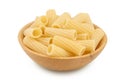 raw italian tortiglioni pasta in wooden bowl isolated on white background with full depth of field Royalty Free Stock Photo