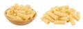 raw italian tortiglioni pasta in wooden bowl isolated on white background with full depth of field Royalty Free Stock Photo