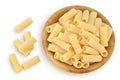 raw italian tortiglioni pasta in wooden bowl isolated on white background with full depth of field. Top view. Flat lay Royalty Free Stock Photo