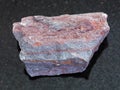 raw jaspilite (ferruginous quartzite) on dark Royalty Free Stock Photo