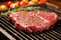 raw juicy steak placed on preheated barbecue grill Royalty Free Stock Photo