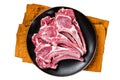 Raw lamb chops, fresh mutton meat cutlets on a ribs Isolated, white background.