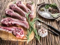 Raw lamb chops with garlic and herbs. Royalty Free Stock Photo