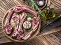 Raw lamb chops with garlic and herbs. Royalty Free Stock Photo