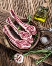 Raw lamb chops with garlic and herbs. Royalty Free Stock Photo