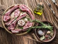 Raw lamb chops with garlic and herbs. Royalty Free Stock Photo