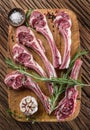 Raw lamb chops with garlic and herbs. Royalty Free Stock Photo