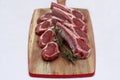 Raw lamb cutlets with rosemary Royalty Free Stock Photo