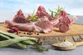 Raw lamb cutlets with rosemary Royalty Free Stock Photo