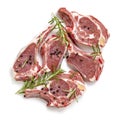Raw Lamb Cutlets Top View with Rosemary and Peppercorns Royalty Free Stock Photo