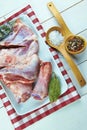 Raw lamb leg with ingredients to roast Royalty Free Stock Photo