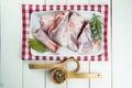 Raw lamb leg with ingredients to roast Royalty Free Stock Photo