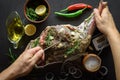 Raw lamb leg, marinated with herbs Royalty Free Stock Photo