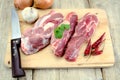 Raw lamb meat on a cutting board Royalty Free Stock Photo