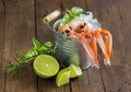 Raw langoustine in a bucket with vegetables and herbs Royalty Free Stock Photo