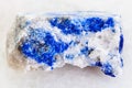 raw lapis lazuli stone on white marble Royalty Free Stock Photo