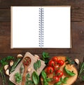 Raw lasagna pasta, vegetables and herbs with notebook Royalty Free Stock Photo