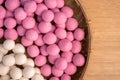 Raw little tangyuan in a sieve over wooden table Royalty Free Stock Photo