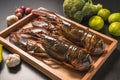 Raw lobster on wooden plate Royalty Free Stock Photo