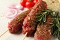 Raw lula kebab, herbs and spices, close up Royalty Free Stock Photo