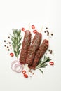 Raw lula kebab, herbs and spices on white background Royalty Free Stock Photo