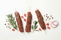 Raw lula kebab, herbs and spices on white background Royalty Free Stock Photo