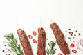 Raw lula kebab, herbs and spices on white background Royalty Free Stock Photo