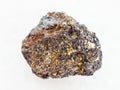 raw magnetite (iron ore) stone on white